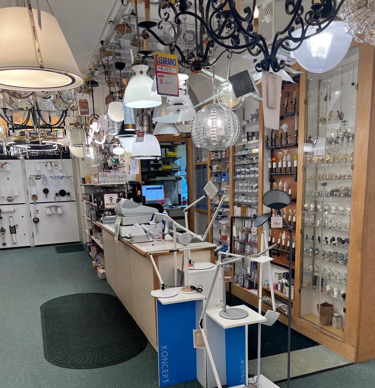 Inside the Fashion Light Center showroom in Greenwich, CT, with chandeliers, pendant lights and desk lamps on display