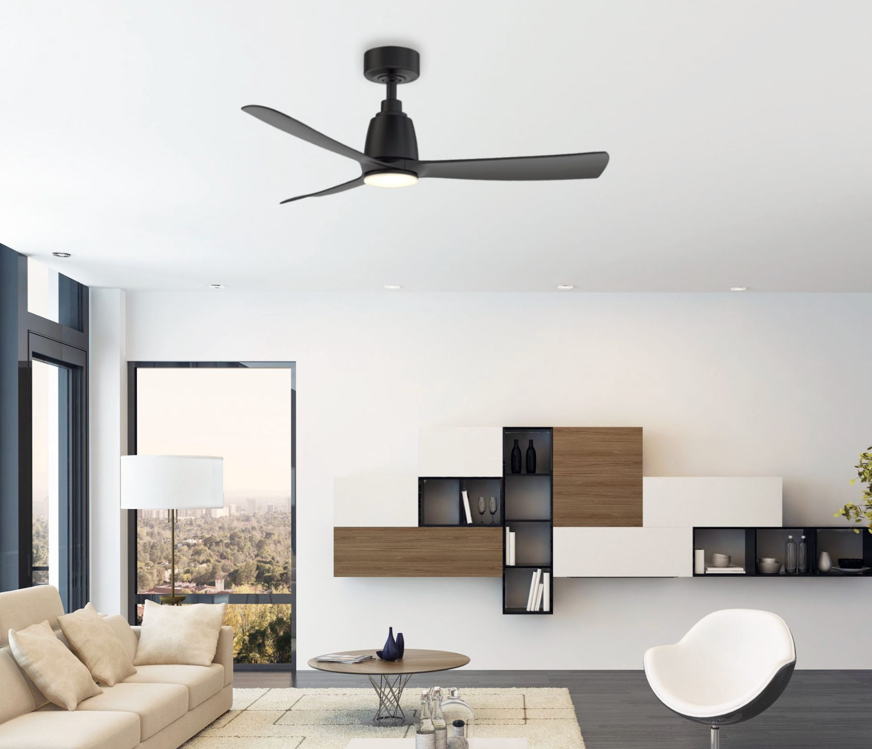 Modern living room with a ceiling fan, sofa, coffee table, and wall decor.
